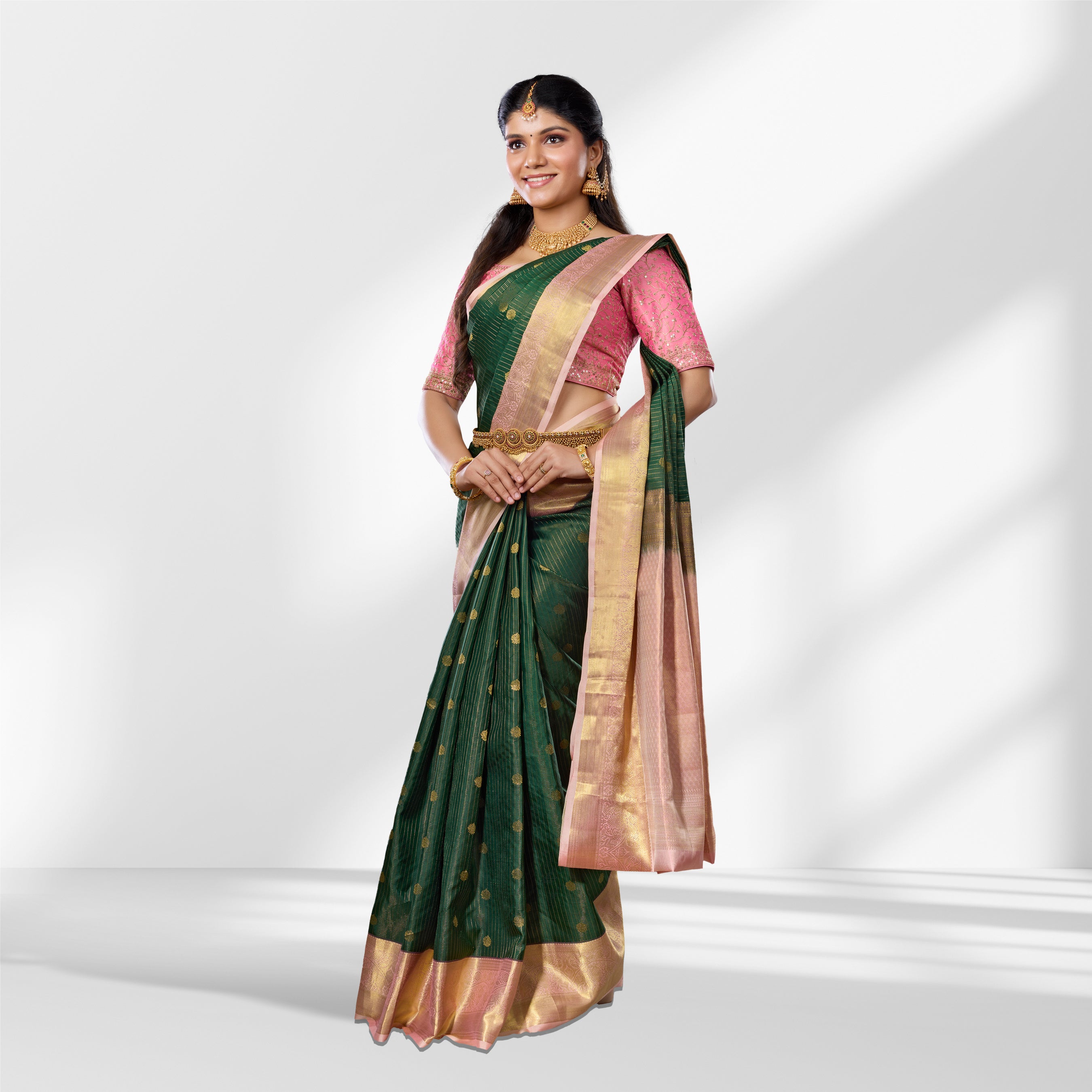 Green and Baby Pink Kanchipuram Silk Saree with Checks and Peacock Butta