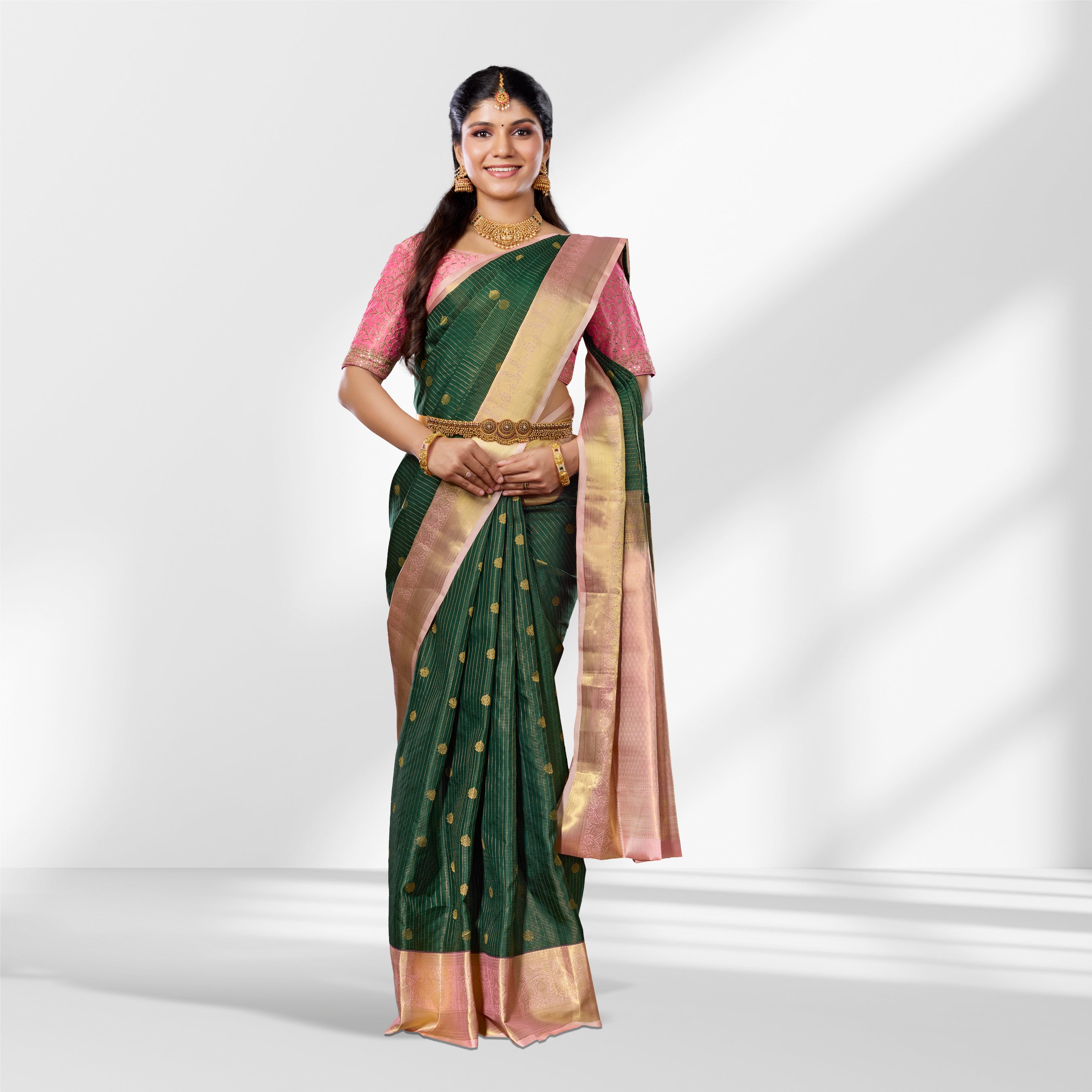 Green and Baby Pink Kanchipuram Silk Saree with Checks and Peacock Butta