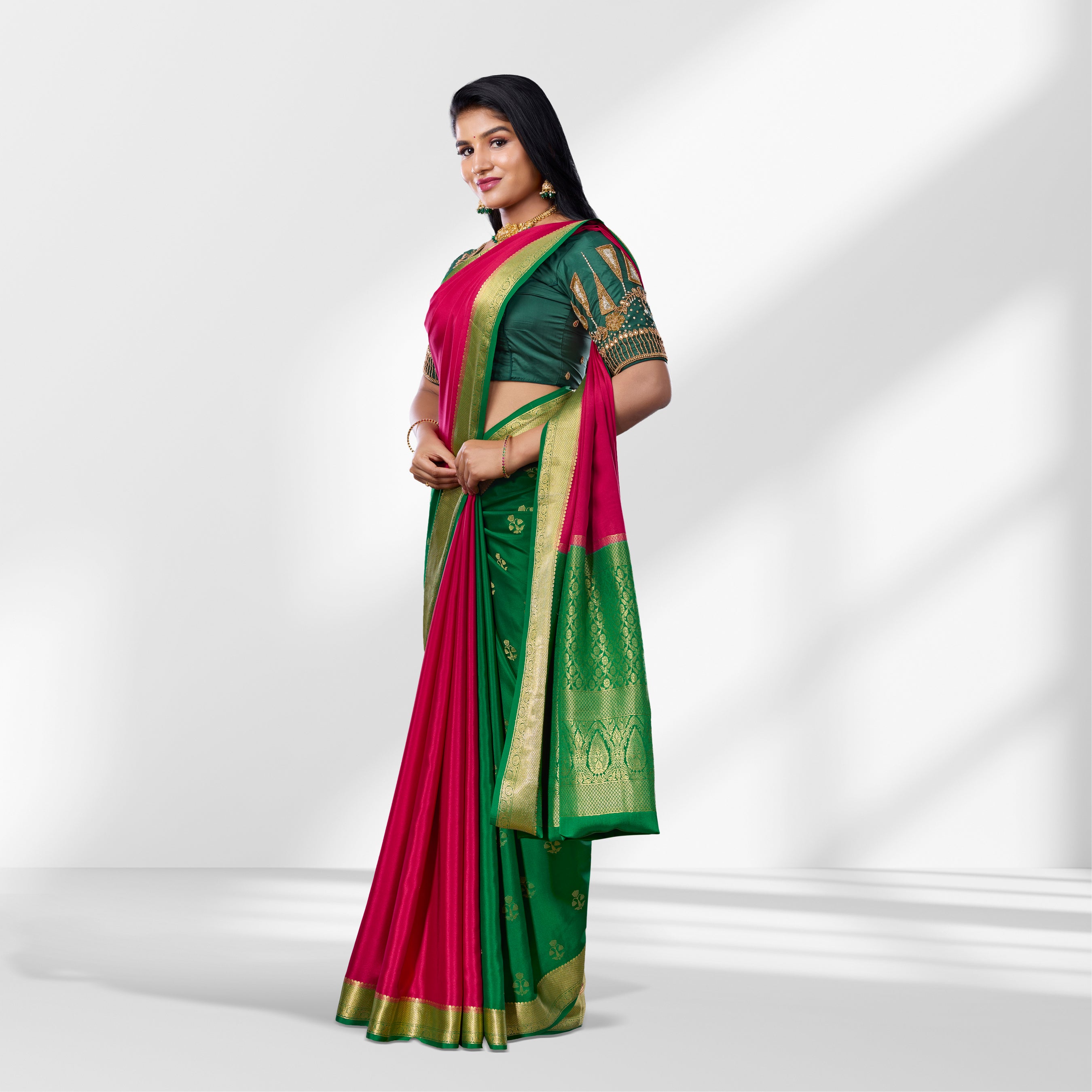 Rani Pink and Bottle Green Kanchipuram Silk Saree with Zari Butta and Rich Contrast Pallu