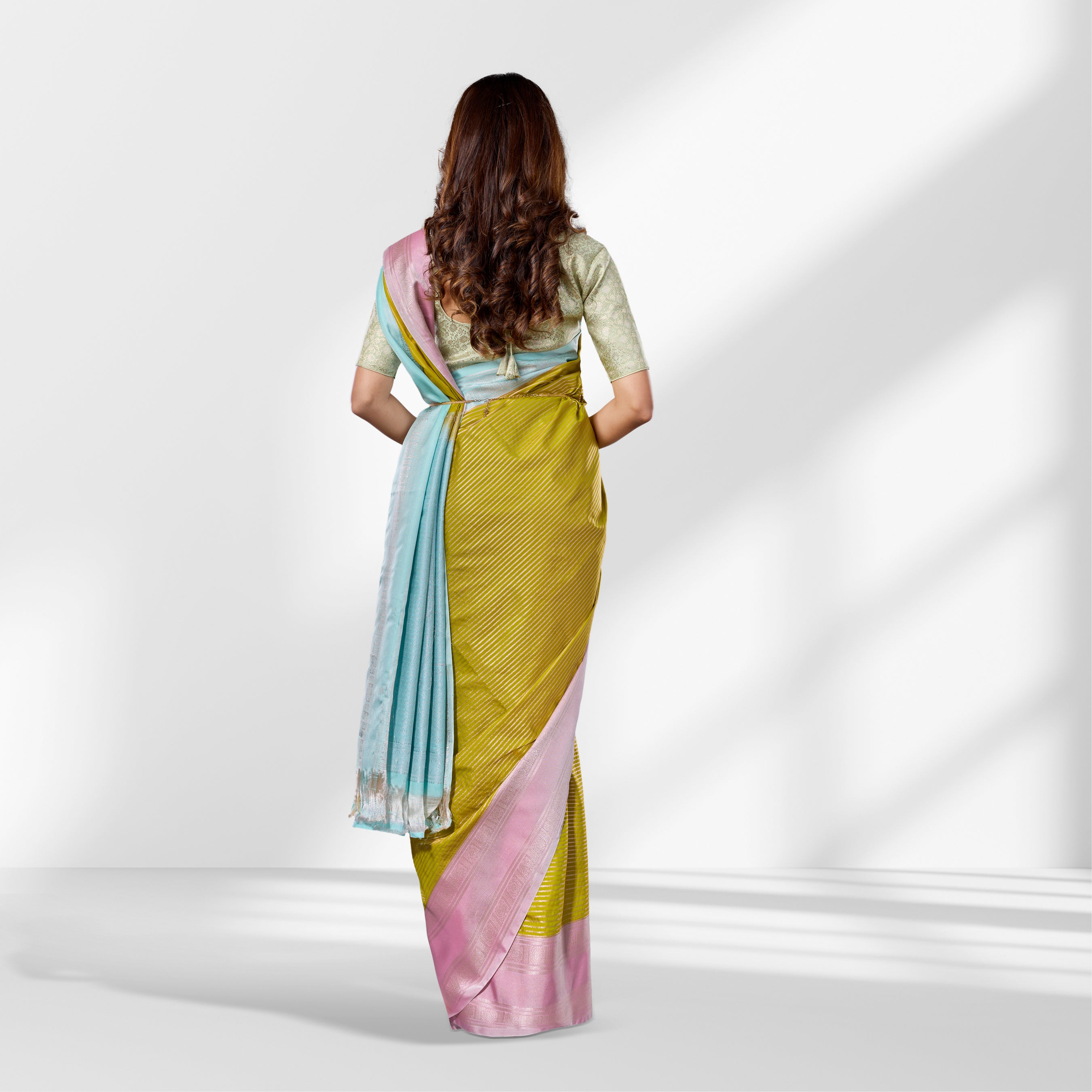 Parrot Green and Baby Pink Semi Kanchipuram Silk Saree with Multicolor Vertical Design