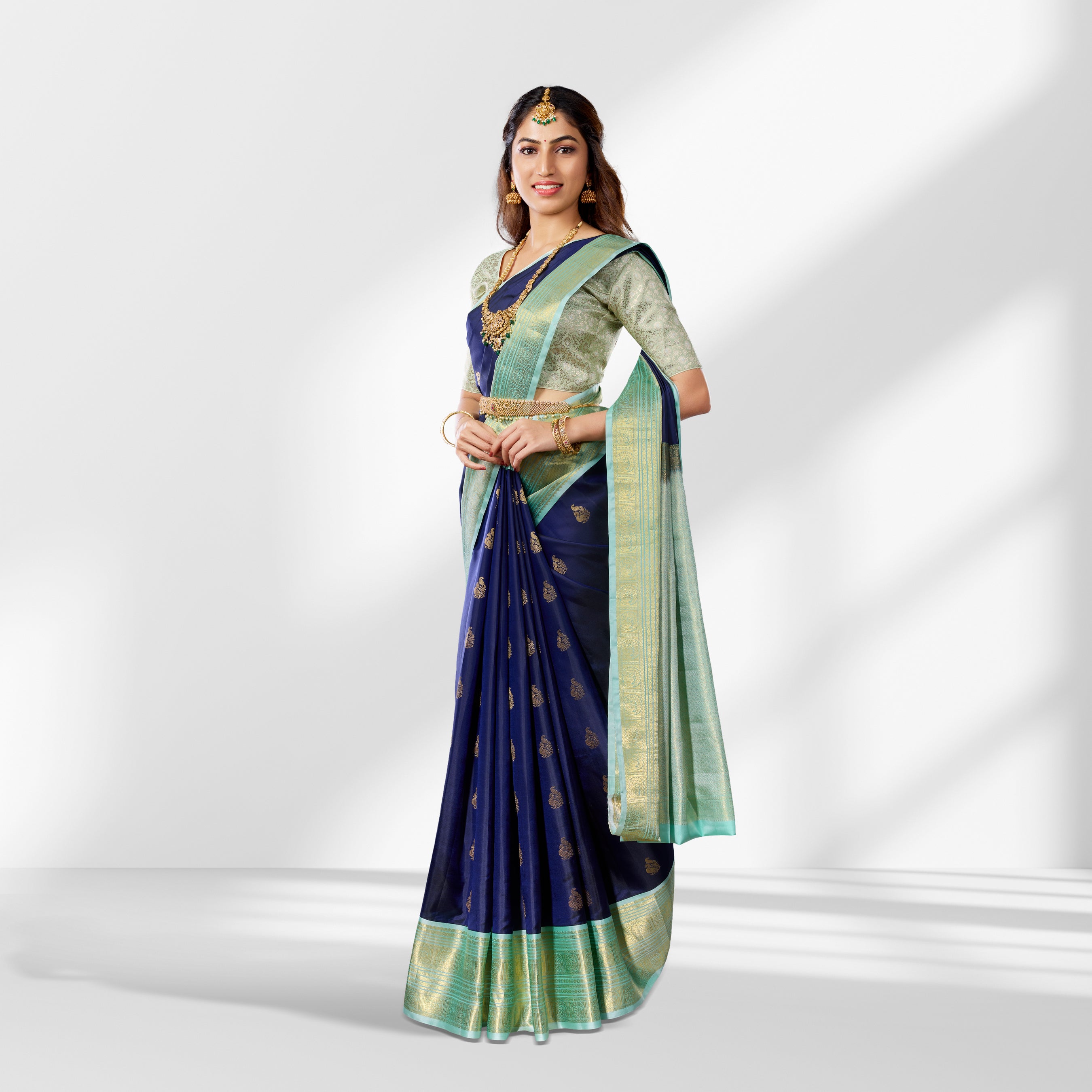 Blue Kanchipuram Silk Saree with Green Border, Pure Zari Peacock Motifs