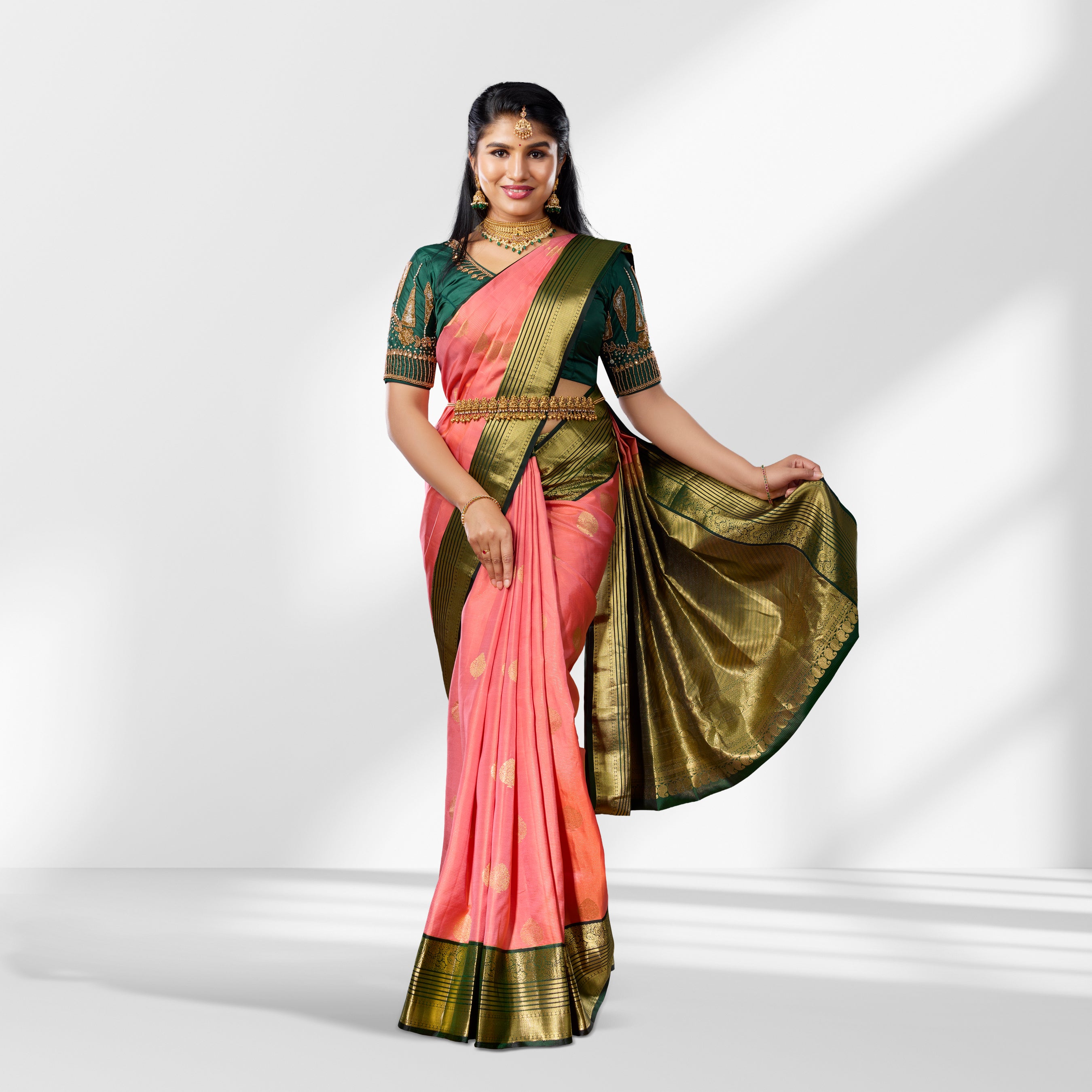 Peach Pink and Bottle Green Kanchipuram Silk Saree with Rich Zari Border