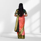 Peach Pink and Bottle Green Kanchipuram Silk Saree with Rich Zari Border