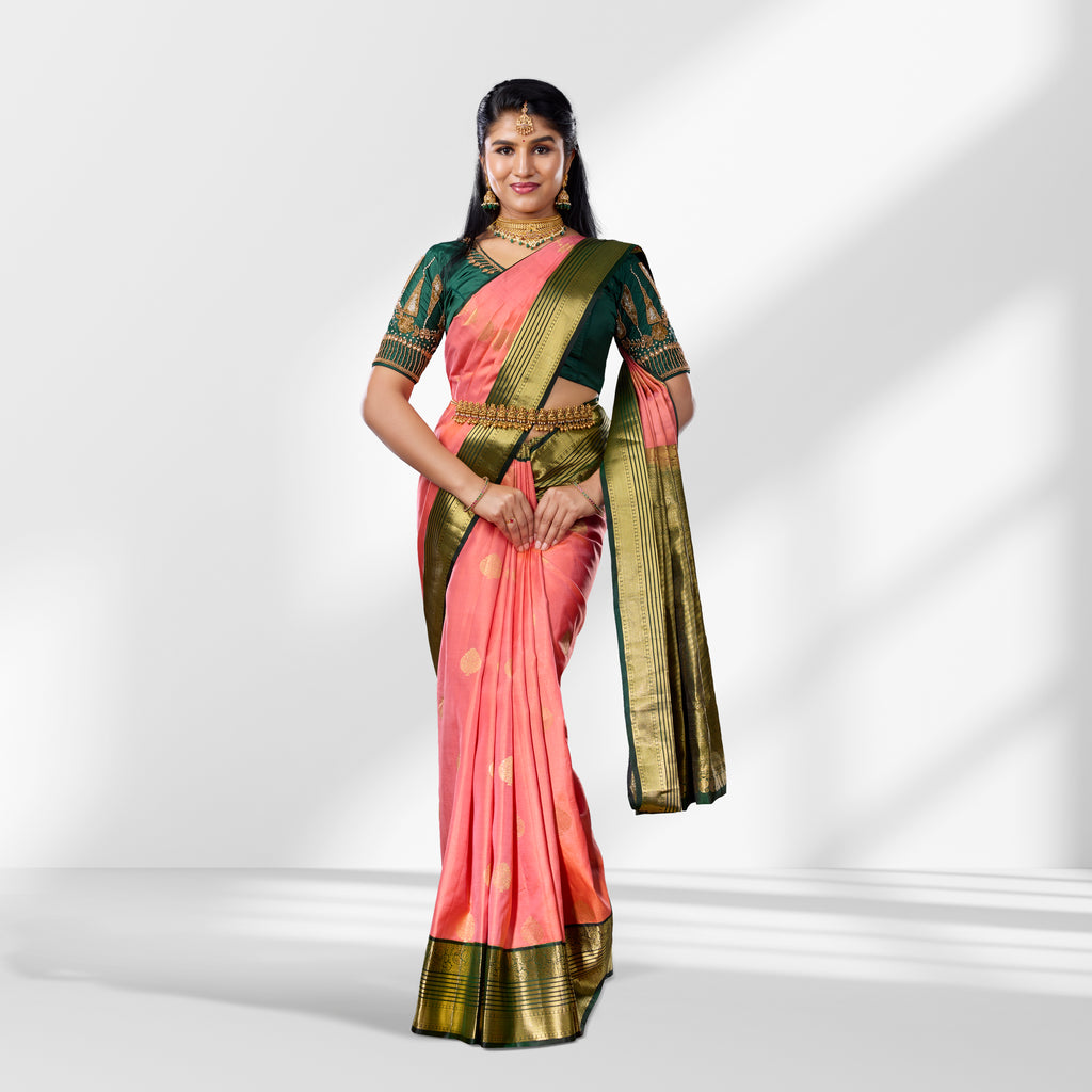 Peach Pink and Bottle Green Kanchipuram Silk Saree with Rich Zari Border