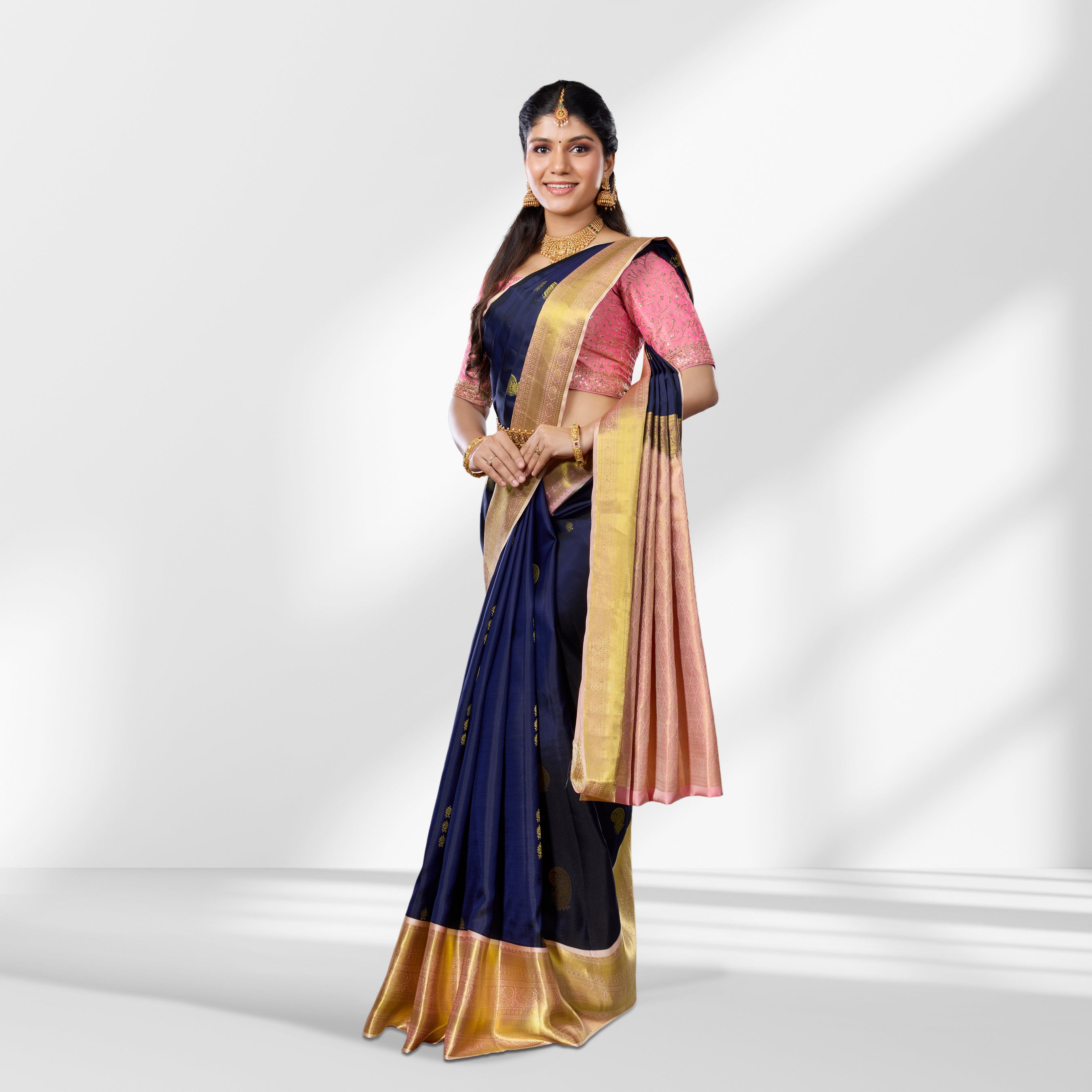 Navy Blue Kanchipuram Silk Saree with Gold Zari Border & Peach Pallu